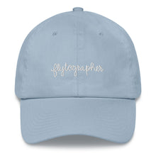 Load image into Gallery viewer, Light blue baseball cap has a low profile with an adjustable strap and curved visor.
