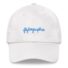 Load image into Gallery viewer, a picture of a 100% Chino cotton twill  white baseball cap with the word Flytographer written on the front of the cap

