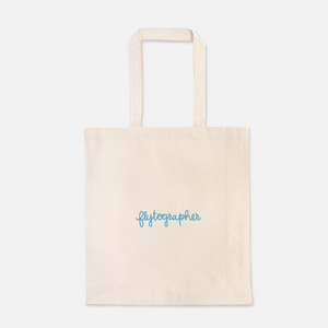 natural colour 100% Cotton Canvas bag with the word with Flytographer logo on the front