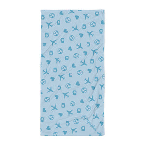 Blue graphic towel with planes, hearts, camera and earth  graphics